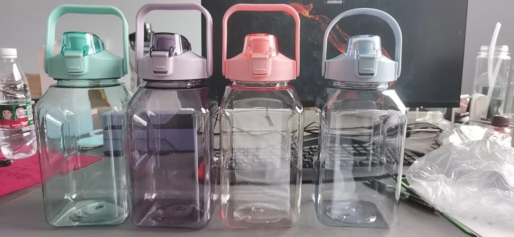 PH-10(F) กระบอกน้ำทรงเหลี่ยม คละสีใส 1500ml.(48ใบ)